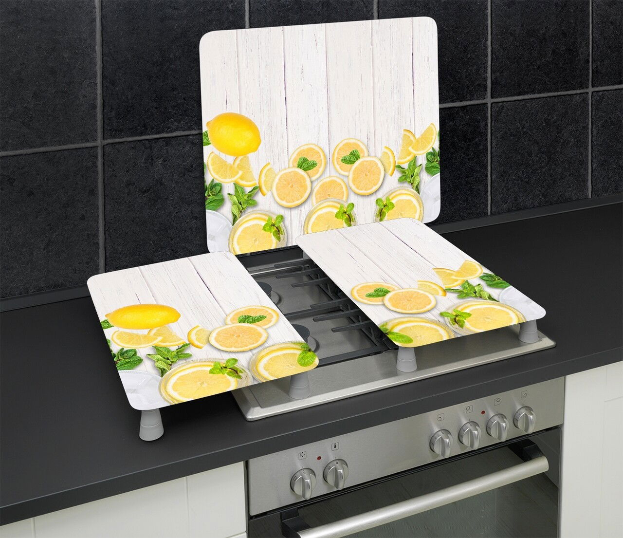 Set 2 protectii universale pentru aragaz Lemons, Wenko, 30x52x1.8-5.5 cm, sticla/PVC, multicolor